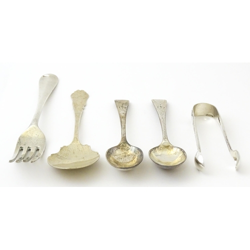 409 - Five assorted silver flatware to include a pair of teaspoons hallmarked London 1910, sugar tongs hal... 
