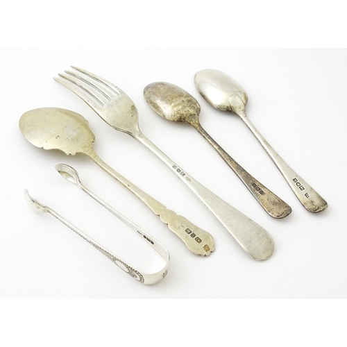 409 - Five assorted silver flatware to include a pair of teaspoons hallmarked London 1910, sugar tongs hal... 