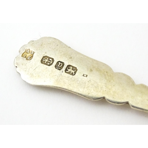 409 - Five assorted silver flatware to include a pair of teaspoons hallmarked London 1910, sugar tongs hal... 