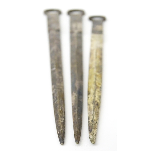 412 - Assorted items to include three silver plate meat skewers, a skewer surmounted by a model of a lobst... 