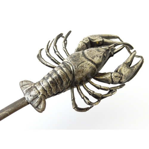 412 - Assorted items to include three silver plate meat skewers, a skewer surmounted by a model of a lobst... 