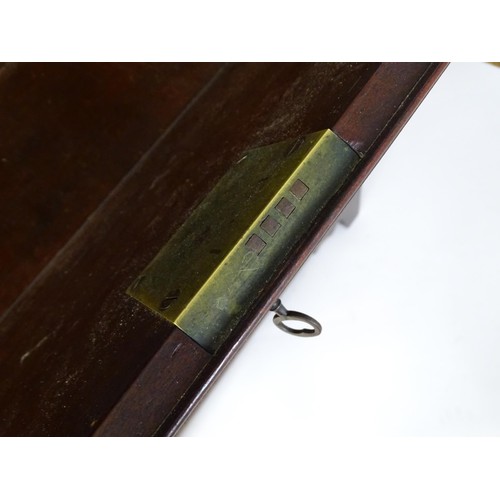 1431 - A George II mahogany bureau bookcase with a moulded cornice above two mirrored doors opening to show... 