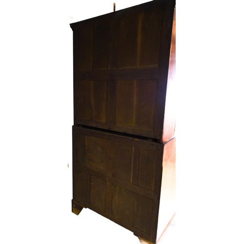 1431 - A George II mahogany bureau bookcase with a moulded cornice above two mirrored doors opening to show... 