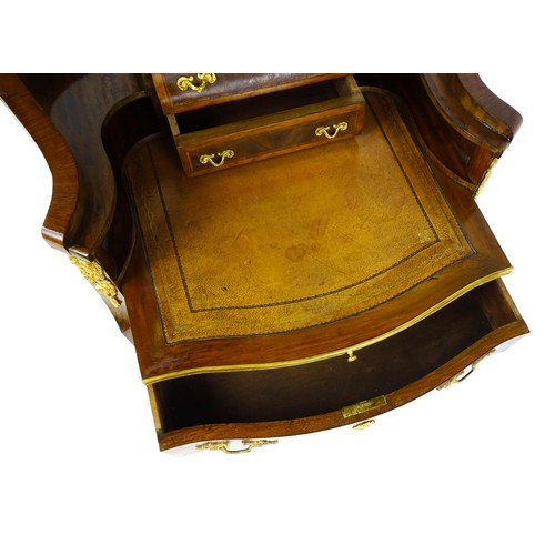 1469 - An early 20thC kingwood and rosewood Bonheur du jour surmounted by a marble panel and pierced gilt s... 