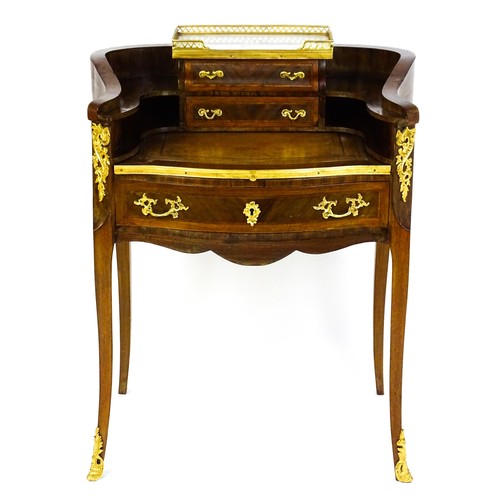 1469 - An early 20thC kingwood and rosewood Bonheur du jour surmounted by a marble panel and pierced gilt s... 