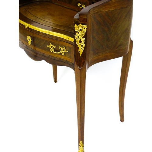 1469 - An early 20thC kingwood and rosewood Bonheur du jour surmounted by a marble panel and pierced gilt s... 