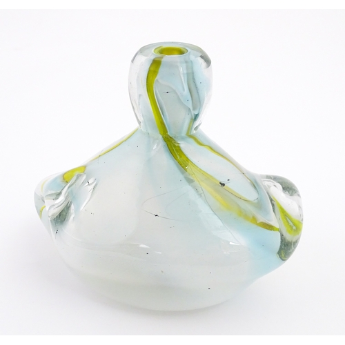 188 - Michael Harris (1933-1994) : A glass vase of compressed form opaque white glass with yellow striatio... 