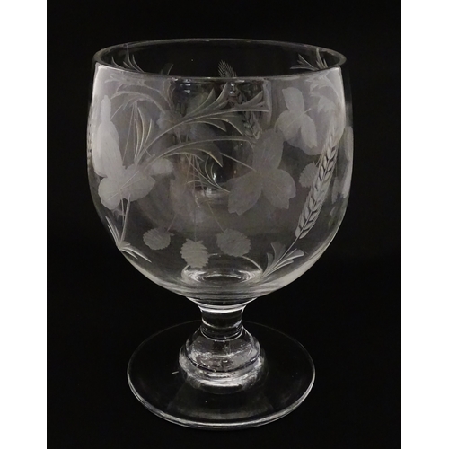 198 - A exceptionally large pedestal glass decorated with etched hops and barley detail. Approx 8 1/2