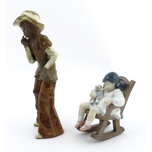 182 - A Lladro model Nap Time, model no. 5448. Together with a ceramic model of a girl. Largest approx. 10... 