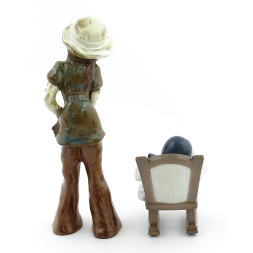 182 - A Lladro model Nap Time, model no. 5448. Together with a ceramic model of a girl. Largest approx. 10... 