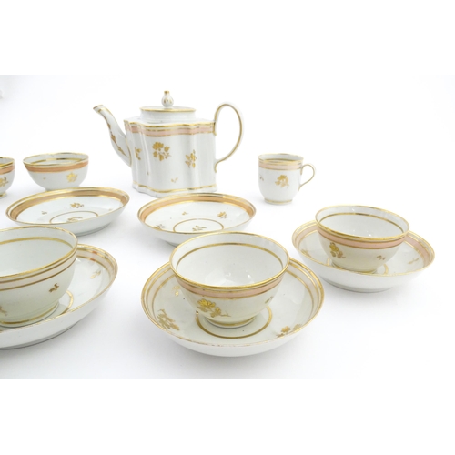 183 - 19thC New Hall tea wares decorated with a pink band and gilt detail, to include teapot, tea bowls, s... 