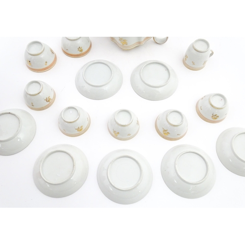 183 - 19thC New Hall tea wares decorated with a pink band and gilt detail, to include teapot, tea bowls, s... 