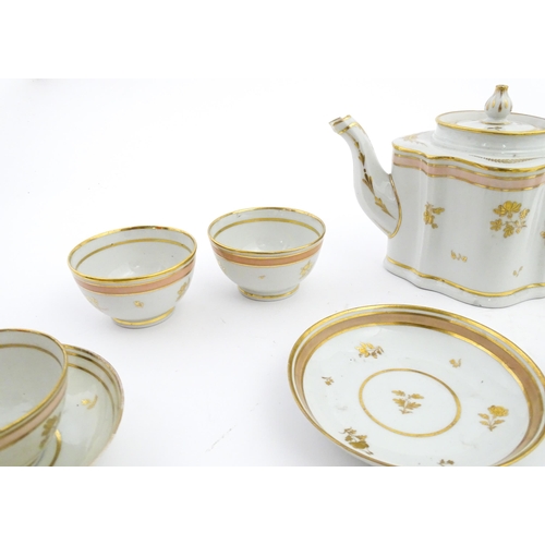183 - 19thC New Hall tea wares decorated with a pink band and gilt detail, to include teapot, tea bowls, s... 
