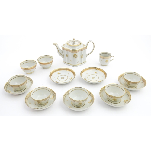 183 - 19thC New Hall tea wares decorated with a pink band and gilt detail, to include teapot, tea bowls, s... 