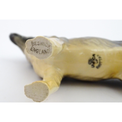 185 - Two Beswick models of dogs comprising a German Shepherd CH Ulrica of Brittas, and a Golden Labrador ... 