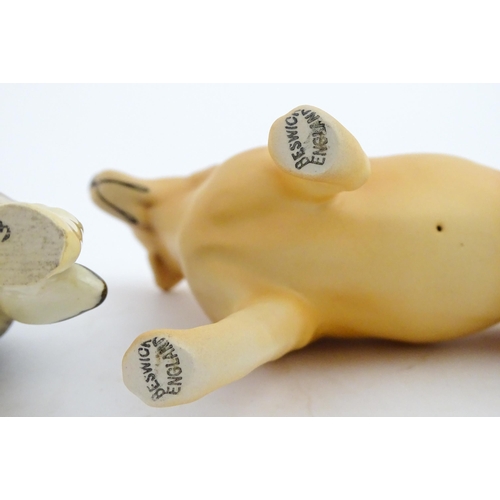 185 - Two Beswick models of dogs comprising a German Shepherd CH Ulrica of Brittas, and a Golden Labrador ... 