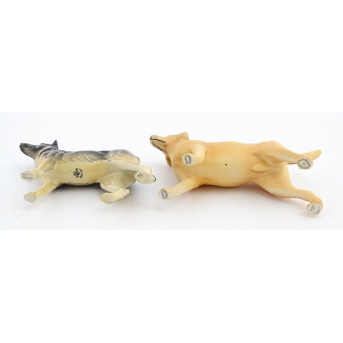 185 - Two Beswick models of dogs comprising a German Shepherd CH Ulrica of Brittas, and a Golden Labrador ... 