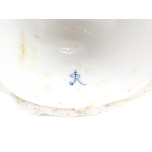 189 - A pair of Continental figural twin branch candlesticks modelled as shepherd and shepherdess, each wi... 