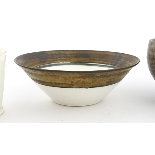 194 - Four studio pottery items to include an oval bowl by Antje Ernestus, a bowl by Richard Baxter, a sma... 