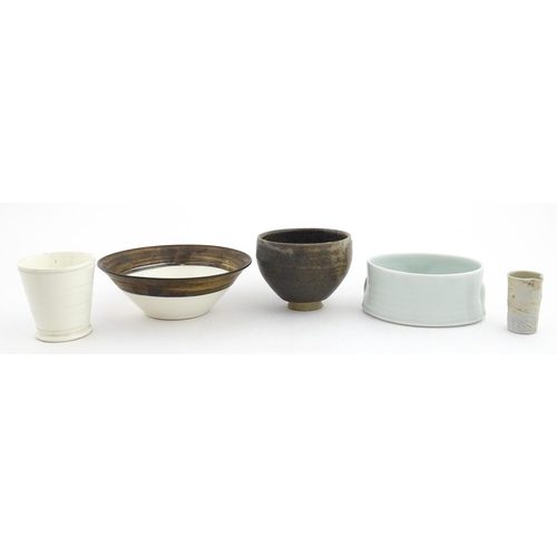194 - Four studio pottery items to include an oval bowl by Antje Ernestus, a bowl by Richard Baxter, a sma... 