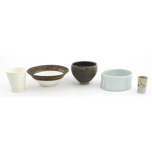 194 - Four studio pottery items to include an oval bowl by Antje Ernestus, a bowl by Richard Baxter, a sma... 