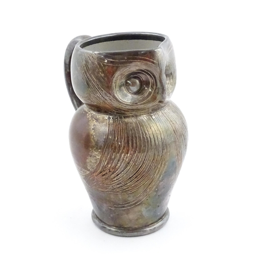 199 - An Arts & Crafts Farnham pottery style owl jug with silver plate overlay. Unmarked. Approx. 6 3/4