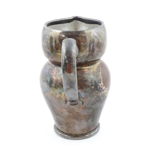 199 - An Arts & Crafts Farnham pottery style owl jug with silver plate overlay. Unmarked. Approx. 6 3/4