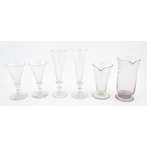 241 - A quantity of assorted 19thC and later drinking glasses together with two measuring jugs / beakers w... 