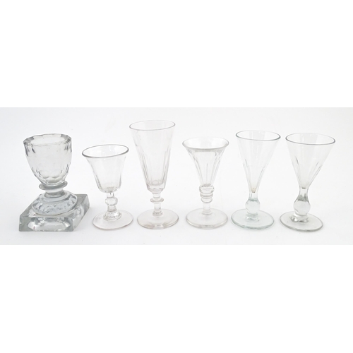 241 - A quantity of assorted 19thC and later drinking glasses together with two measuring jugs / beakers w... 