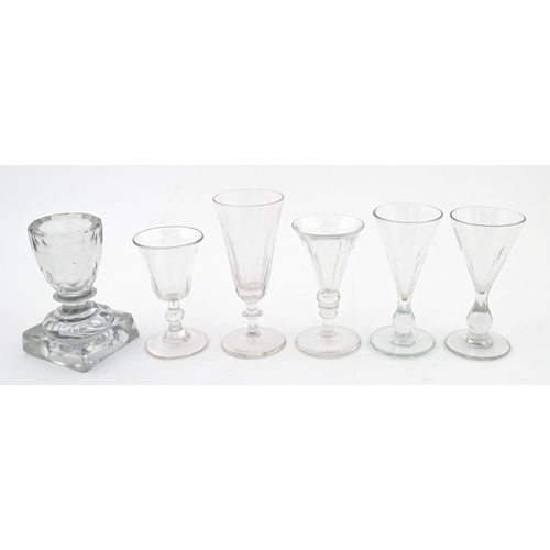 241 - A quantity of assorted 19thC and later drinking glasses together with two measuring jugs / beakers w... 