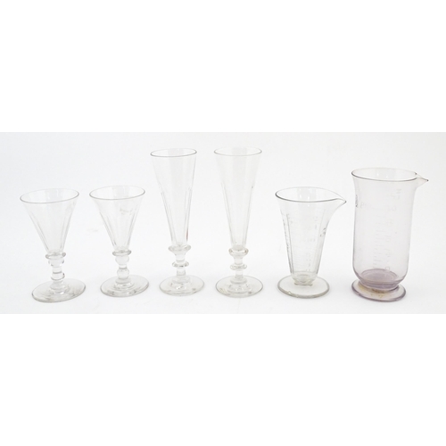 241 - A quantity of assorted 19thC and later drinking glasses together with two measuring jugs / beakers w... 