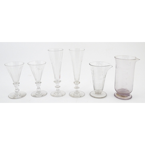 241 - A quantity of assorted 19thC and later drinking glasses together with two measuring jugs / beakers w... 