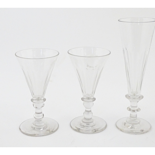 241 - A quantity of assorted 19thC and later drinking glasses together with two measuring jugs / beakers w... 