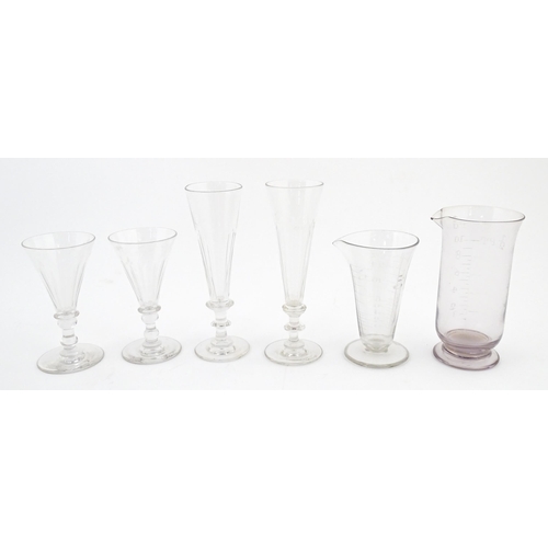 241 - A quantity of assorted 19thC and later drinking glasses together with two measuring jugs / beakers w... 