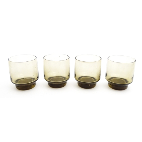 242 - A set of eight retro glass drinking glasses. Approx 3 1/2