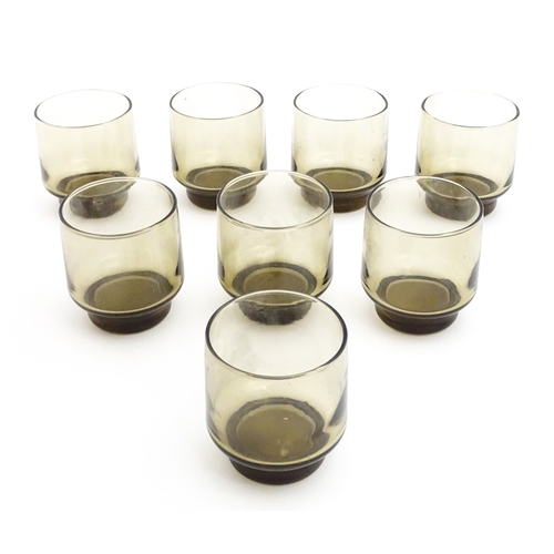 242 - A set of eight retro glass drinking glasses. Approx 3 1/2