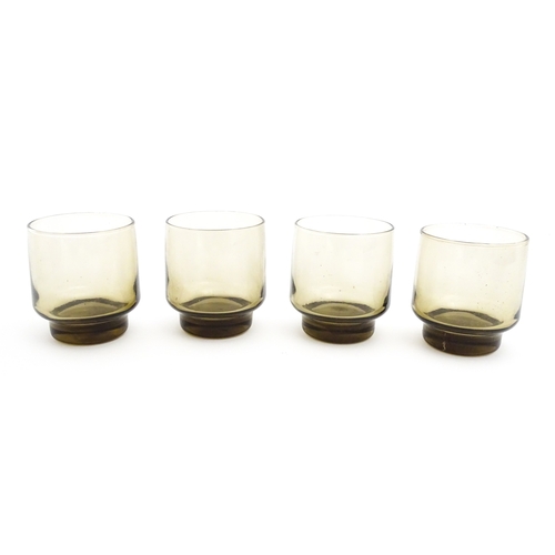 242 - A set of eight retro glass drinking glasses. Approx 3 1/2