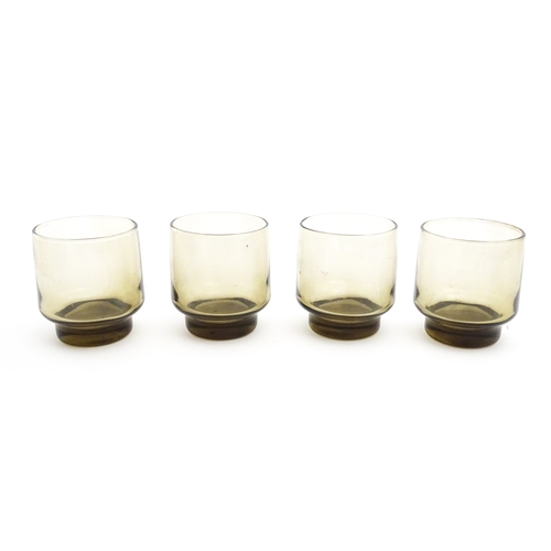 242 - A set of eight retro glass drinking glasses. Approx 3 1/2