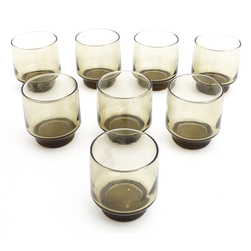 242 - A set of eight retro glass drinking glasses. Approx 3 1/2