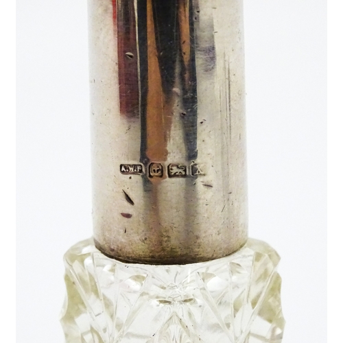 232 - A quantity of perfume / scent bottles together with a dressing table pot etc. One scent bottle havin... 