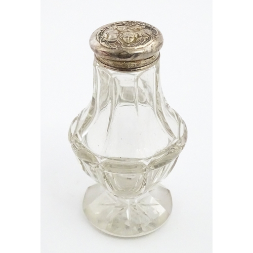 232 - A quantity of perfume / scent bottles together with a dressing table pot etc. One scent bottle havin... 