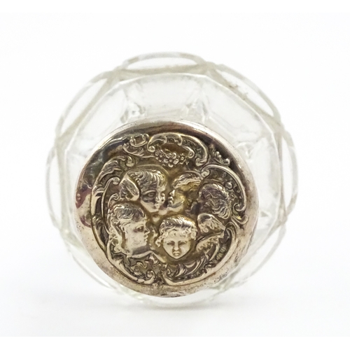 232 - A quantity of perfume / scent bottles together with a dressing table pot etc. One scent bottle havin... 