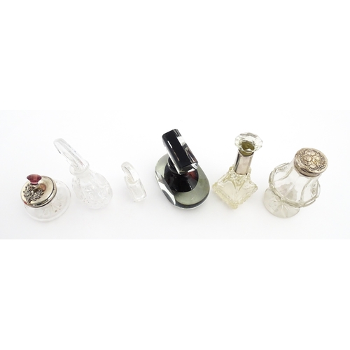 232 - A quantity of perfume / scent bottles together with a dressing table pot etc. One scent bottle havin... 