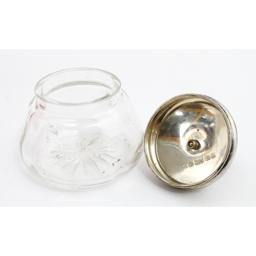 232 - A quantity of perfume / scent bottles together with a dressing table pot etc. One scent bottle havin... 