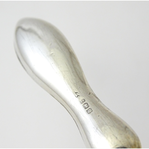 494 - Four various silver handled button hooks. To include examples hallmarked Birmingham 1898 maker Adie ... 