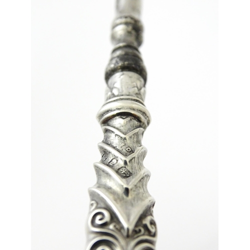 494 - Four various silver handled button hooks. To include examples hallmarked Birmingham 1898 maker Adie ... 