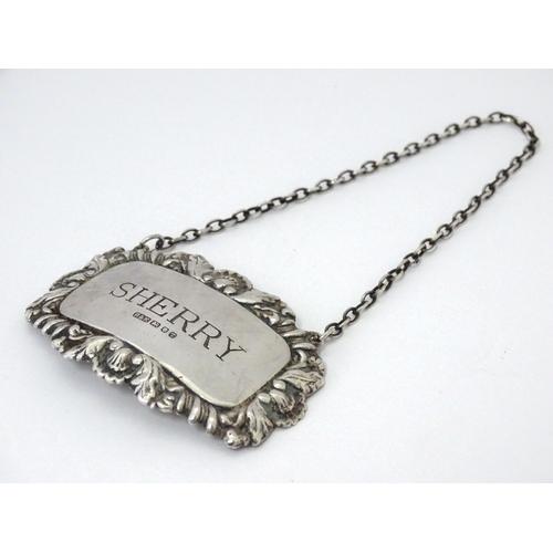 497 - A silver decanter / wine label / bottle ticket for Sherry hallmarked London 1993, maker Richards & K... 