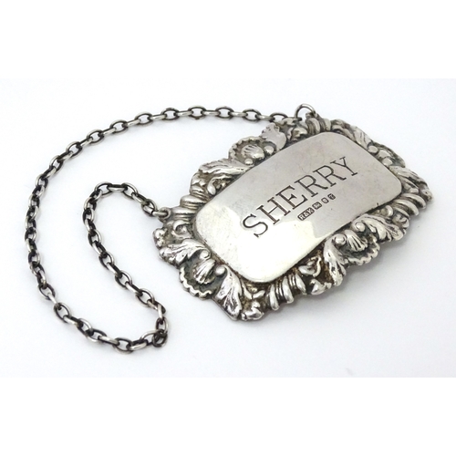 497 - A silver decanter / wine label / bottle ticket for Sherry hallmarked London 1993, maker Richards & K... 