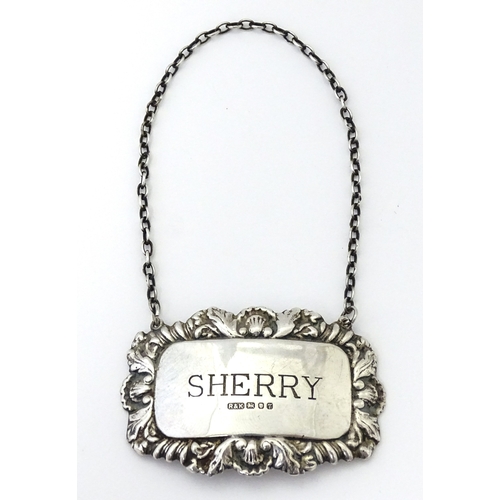 497 - A silver decanter / wine label / bottle ticket for Sherry hallmarked London 1993, maker Richards & K... 