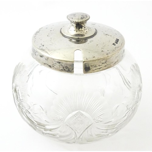 506 - A cut glass preserve pot with silver lid, hallmarked Sheffield 1921, maker Cooper Brothers & Sons Lt... 